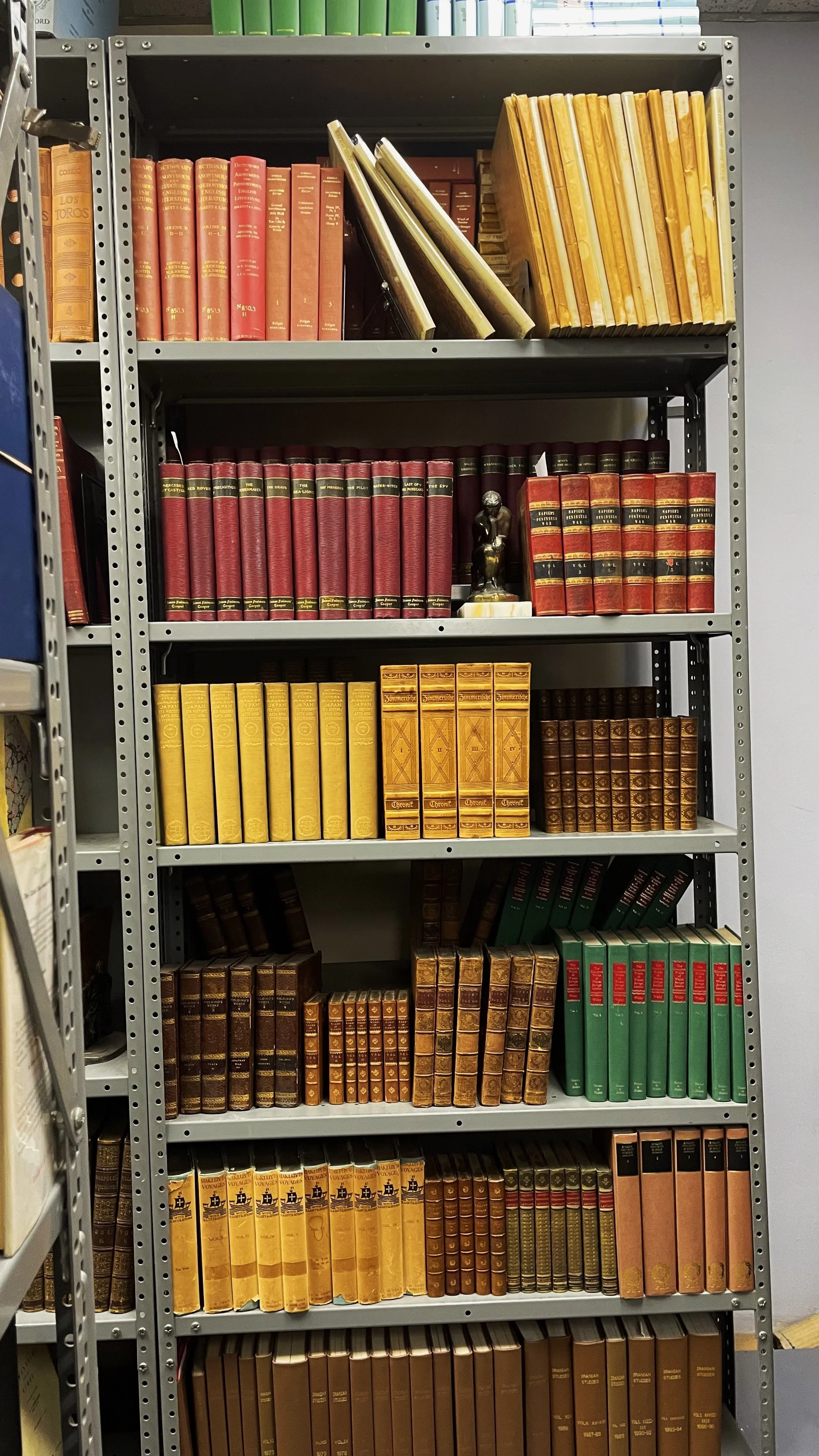 Leather-bound books on display on the third floor.