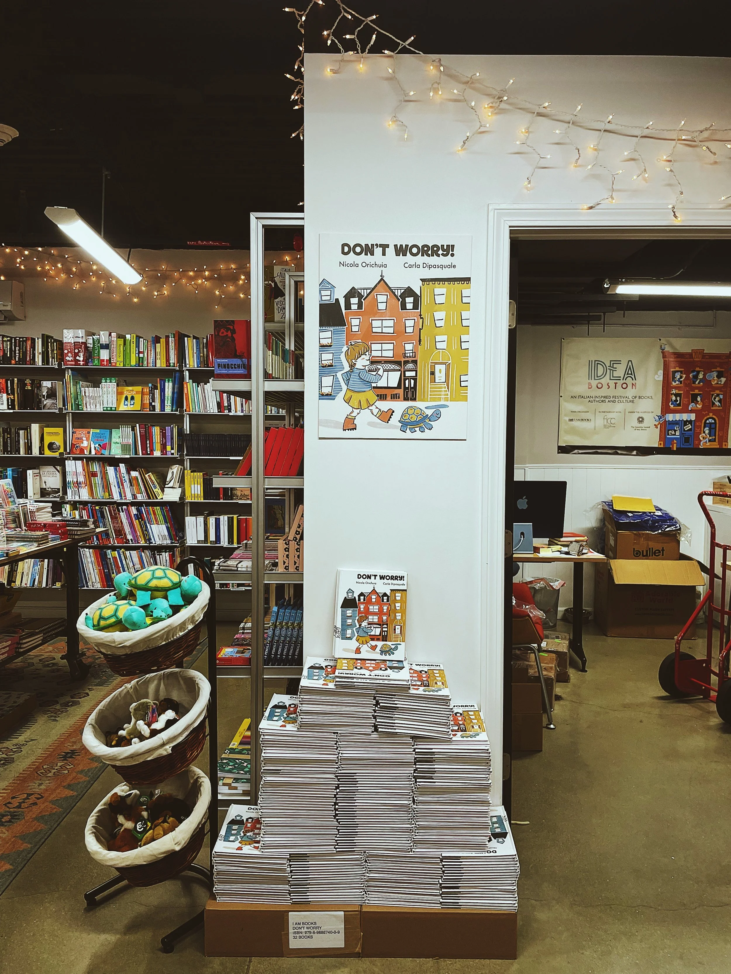 Many stacked copies of Nicola Orichiuia’s newly published children’s book, Don’t Worry!
