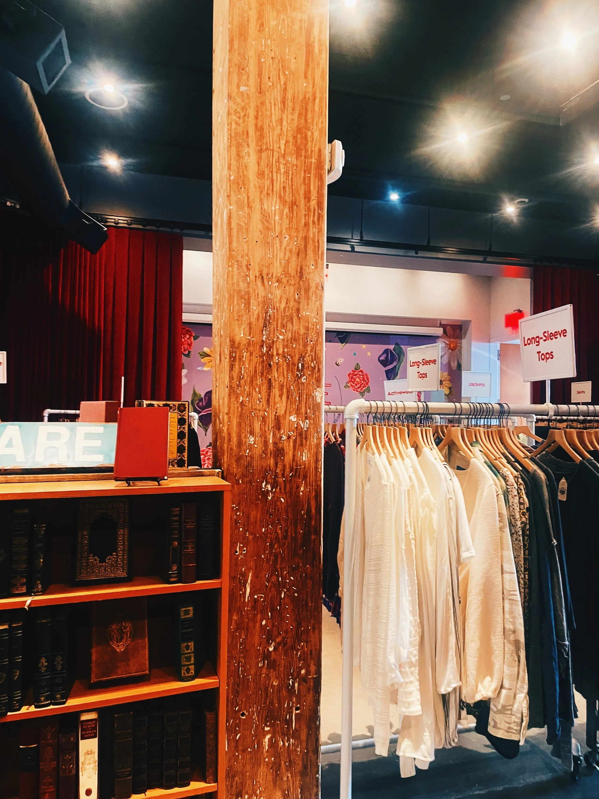 Cute clothes, and a section of Rare books for sale.